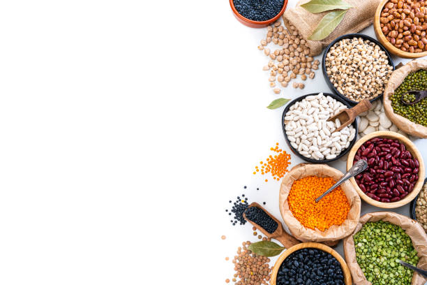istock Dried legumes and beans border on white background 1325084959