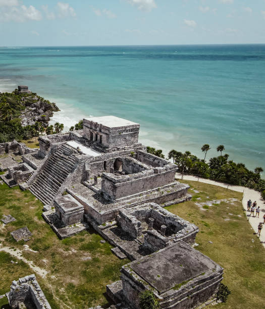 Tulum Ruins Aerial photo of the Tulum Ruins in Tulum, Mexico maya temple stock pictures, royalty-free photos & images