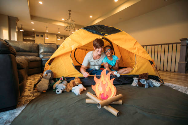 istock Mother and Daughter Camping at Home 1325088959