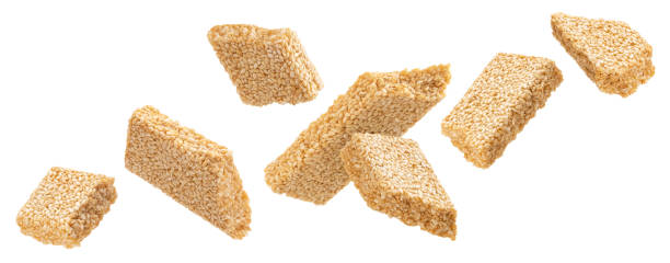istock Falling sesame kozinaki isolated on white background 1325090727