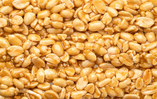 istock Peanut kozinaki texture, close up 1325090755