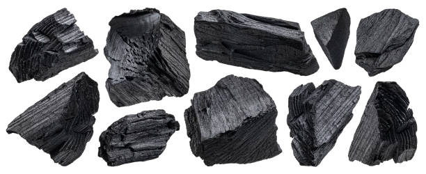 istock Natural wood charcoal isolated on white background 1325090791