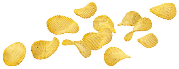 Ridged potato chips isolated on white background Ridged potato chips with sour cream and green onion flavor isolated on white background with clipping path, collection potato chip stock pictures, royalty-free photos & images