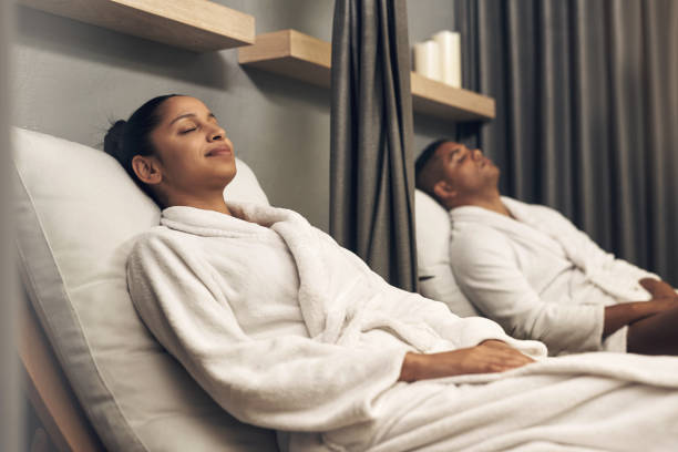 Shot of a young couple spending the day together at a spa A couples spa day is always a good idea spa stock pictures, royalty-free photos & images
