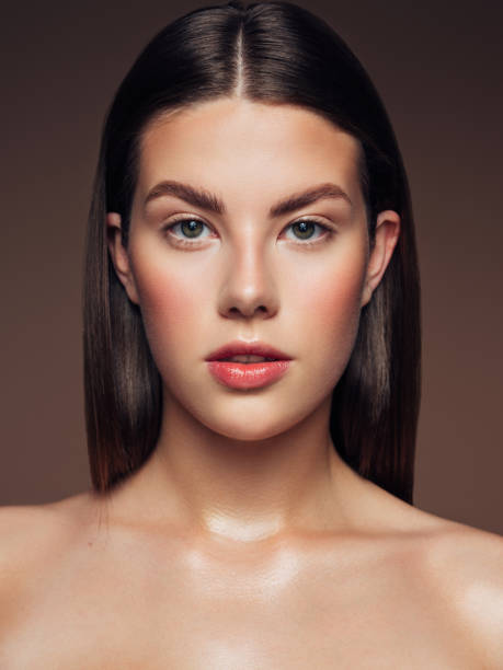 istock Young woman with clean and fresh skin 1325100620