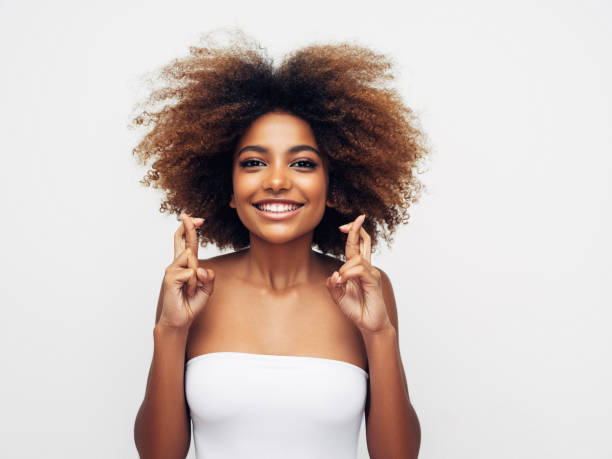 istock Beautiful smiling girl with curly hairstyle 1325100986