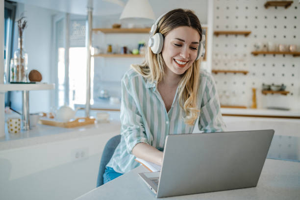 istock E learning for young woman at home 1325101244