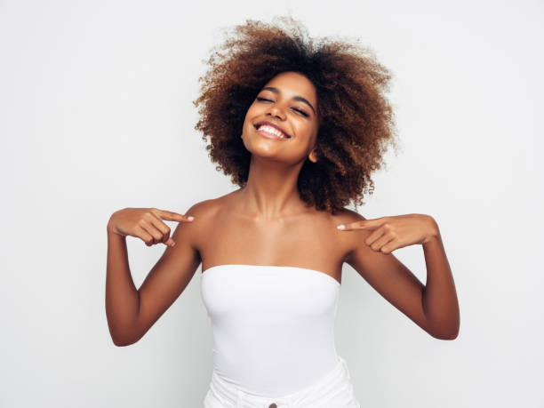 istock Beautiful smiling girl with curly hairstyle 1325101832