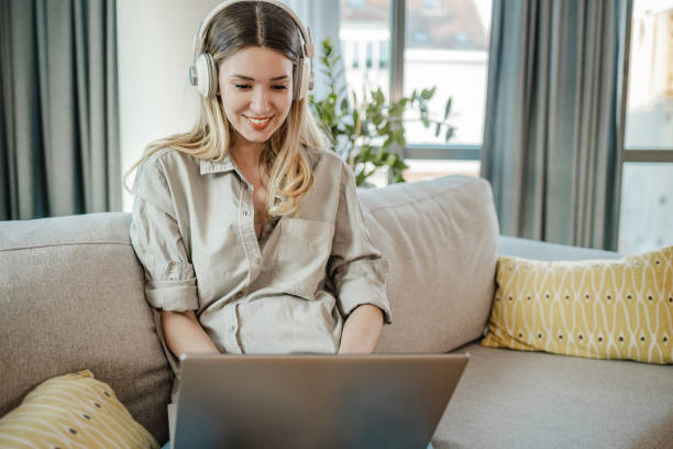 istock A young woman is using laptop at home 1325102365