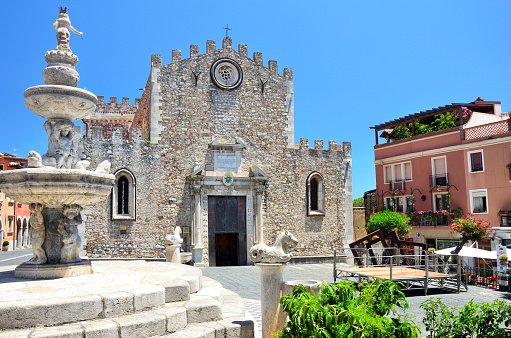 Duomo or the cathedral of San Nicola was constructed in the 13th century on the ruins of an ancient church, Taormina, Sicily. The fountain was built in 1635 in the Baroque style, is also called \