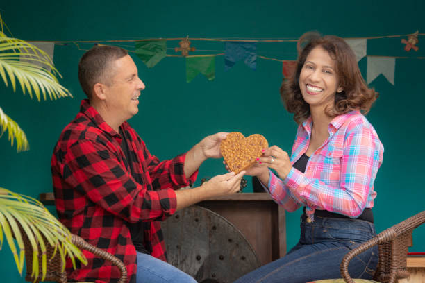 istock couple holding heart peanuts 1325103851