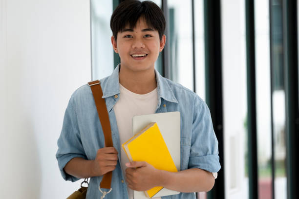 istock Male asian college student 1325105262