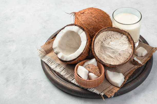 istock Fresh coconut and coconut products on a gray background 1325109277