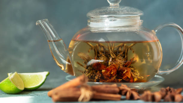 istock Glass teapot with green tea 1325109505