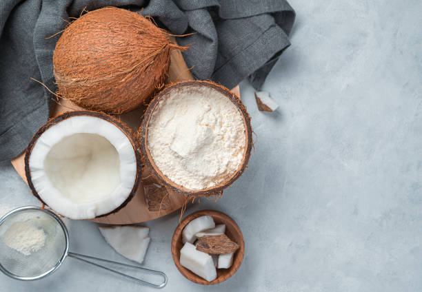 istock Coconut flour and coconut on a gray background 1325110642