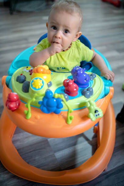 istock Baby in baby walker 1325113397