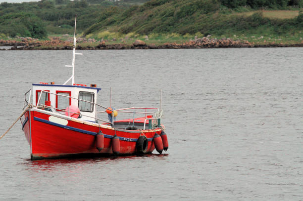 istock Red Fishing Boat 1325115353