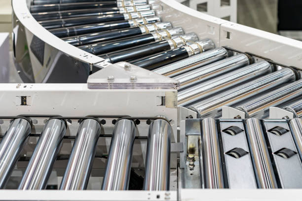 istock roller conveyor of automatic production line of manufacturing process for transportation material goods or product etc. in industrial 1325116770