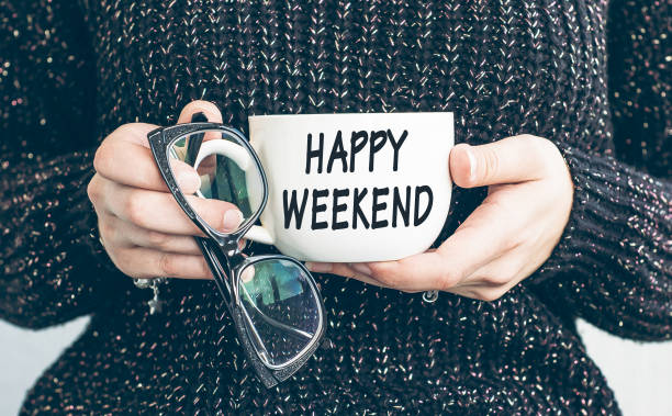 istock Happy weekend text on cap of coffee 1325125973