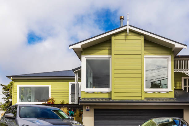 Teddy bears in a house window, part of the "bear hunt" designed to distract and amuse children on exercise walks during coronavirus (covid-19) pandemic. Wellington, New Zealand - March 31, 2020: Teddy bears in a house window, part of the "bear hunt" designed to distract and amuse children on exercise walks during coronavirus (covid-19) pandemic. amuse stock pictures, royalty-free photos & images