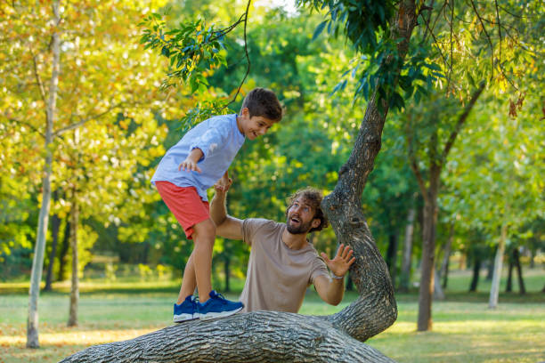istock A Happy Kid is Spending a Wonderful Day with Father in Nature. 1325132525