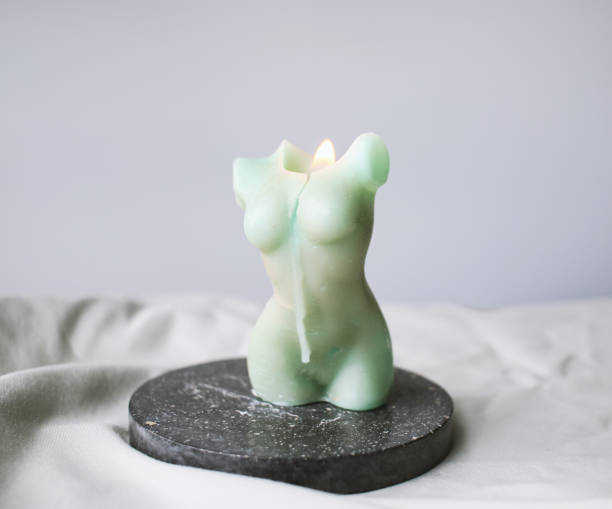 istock Body shape candle spa still life 1325132563