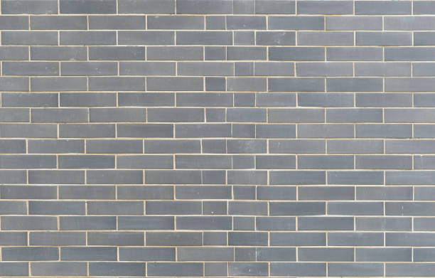 istock Brick and stone walls, red leaves 1325142893