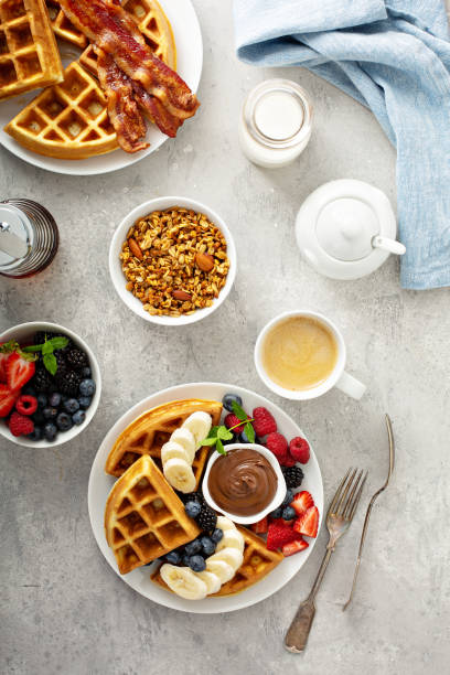 istock Waffles with berries and chocolate for breakfast 1325150652