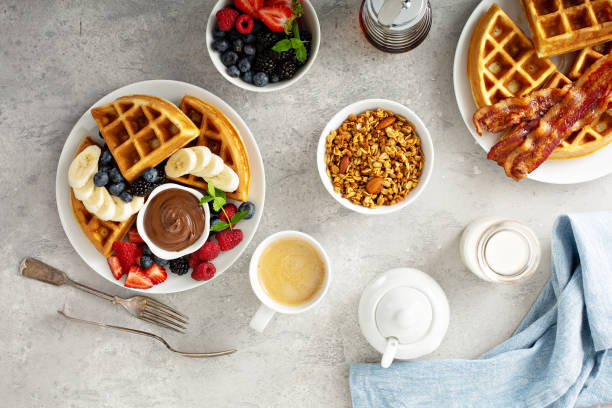 istock Waffles with berries and chocolate for breakfast 1325150675