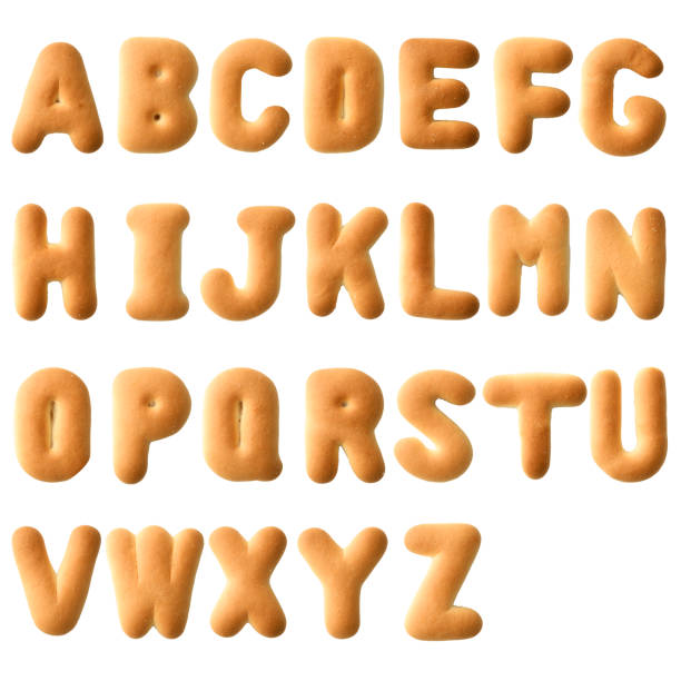 istock Isolated shot of uppercase alphabetical order in biscuit on white background 1325152254