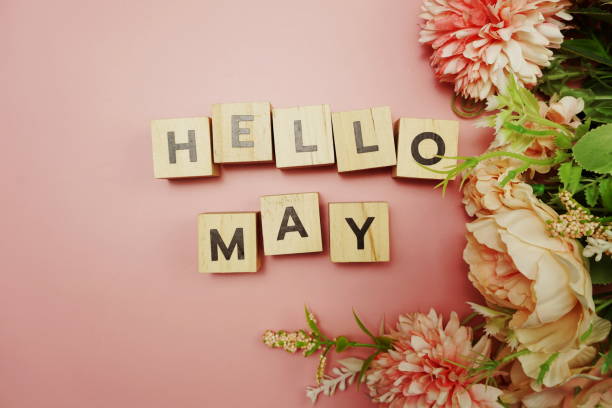 istock Hello May alphabet letter with space copy on pink background 1325154990