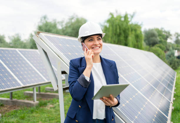 istock A Female Manager Engineer İn Safety Helmet Checking With Tablet An Operation Of Solar Panel System At Solar Station 1325161632