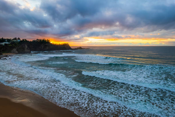 istock South Coast Sunrise Seascape and light high cloud 1325161847
