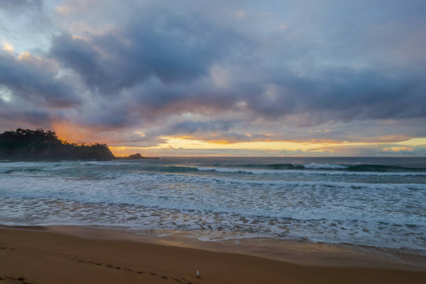 istock South Coast Sunrise Seascape and light high cloud 1325161872