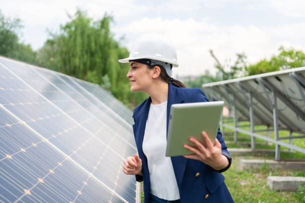 istock A Female Manager Engineer İn Safety Helmet Checking With Tablet An Operation Of Solar Panel System At Solar Station 1325165753