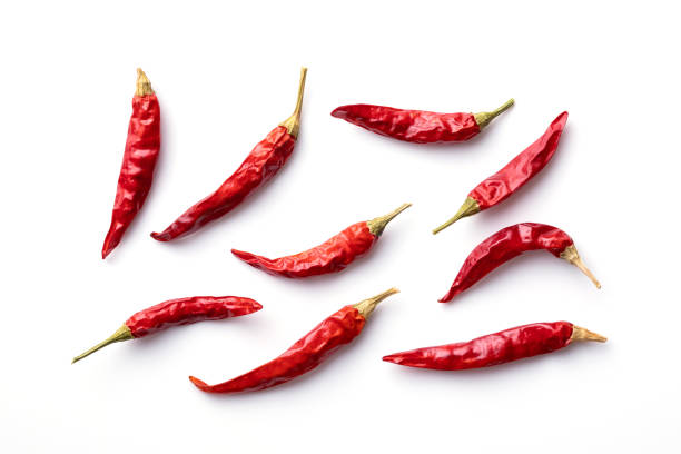 Chili peppers Chili peppers on white background chilli powder stock pictures, royalty-free photos & images