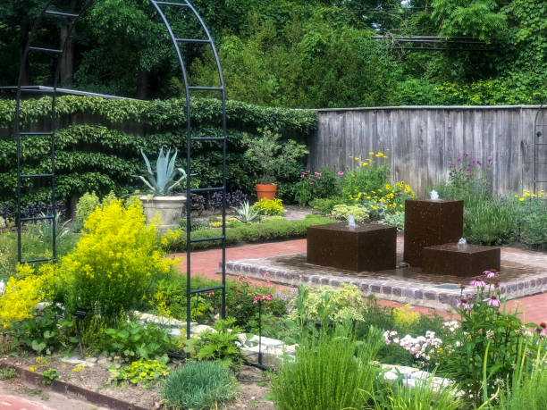 istock Garden setting with brown water fountains 1325168782