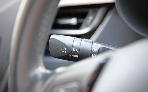 istock Switch off lights in a car - Close-up Car integrated turning indicator with headlight switch toggle 1325171622