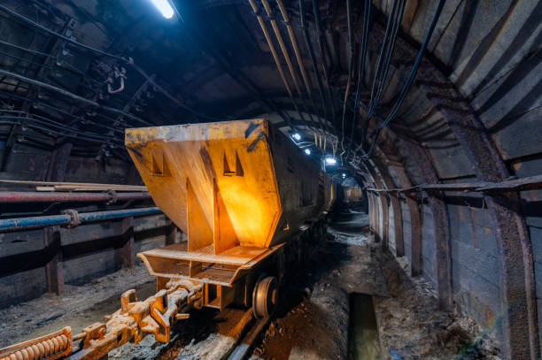 istock Underground mine. Underground railway for transporting ore. Mine trolley as part of an underground freight train 1325175240