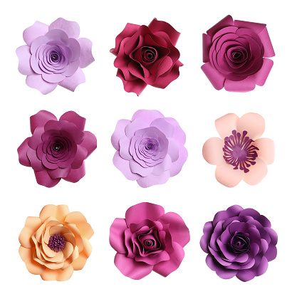 Set with beautiful flowers made of paper on white background, top view