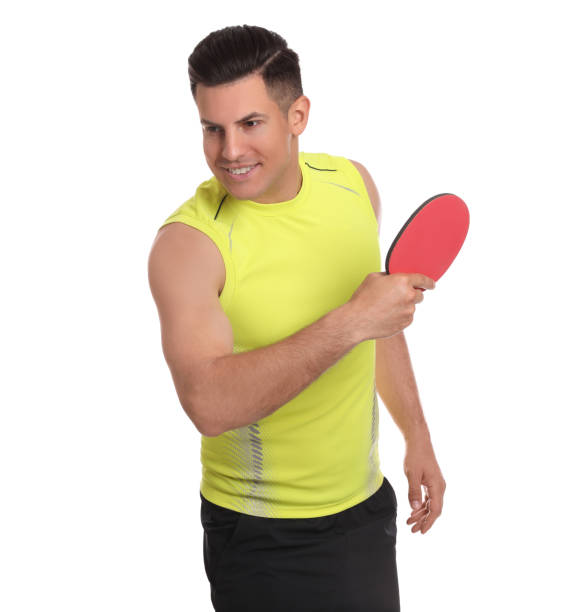 istock Handsome man with table tennis racket on white background. Ping pong player 1325180926