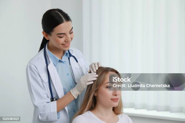 Young Woman Visiting Trichologist In Light Clinic Stock Photo - Download  Image Now - Dermatologist, Hair, Doctor - iStock