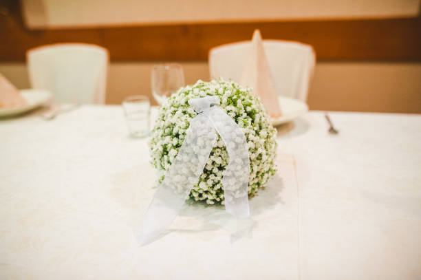 A stunning bouquet of flowers in a ballroom.