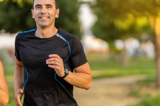 istock Happy Runner Man in the Park 1325182626