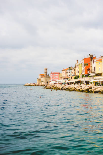 View of Piran town, Slovenia. Piran is a town in southwestern Slovenia on the Gulf of Piran on the Adriatic Sea. It is one of the three major towns of Slovenian Istria. The town has much medieval architecture, with narrow streets and compact houses. Piran is the administrative centre of the local area and one of Slovenia's major tourist attractions.