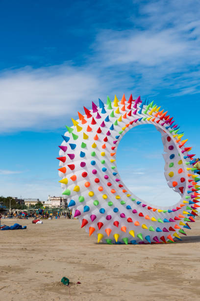 istock Colorful Kites flying over the sky 1325185695