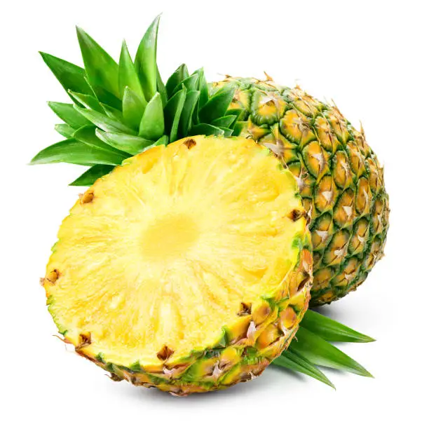 Photo of Pineapple isolated. Whole pineapple with half and leaves. Whole and cut half pineapple on white. Full depth of field.