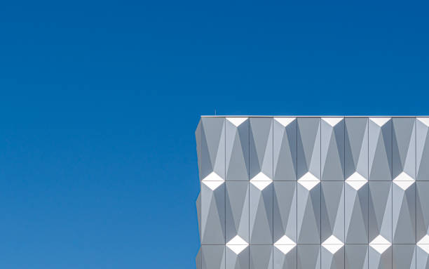 istock Low Angle View Of Building Against Clear Blue Sky 1325187113