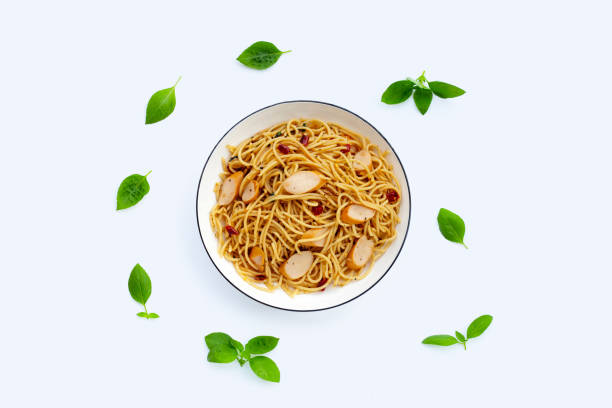 Spaghetti with dried chili and hot dogs