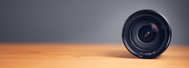 istock black lens on a wooden background 1325190433
